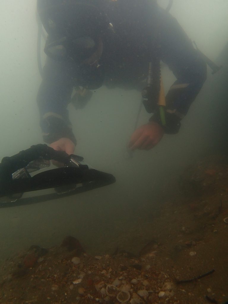 Dr Rodrigo Pacheco-Ruiz scanning the archaeological excavation site using a multi-source underwater photogrammetry rig (Image EEFE).OLYMPUS DIGITAL CAMERA