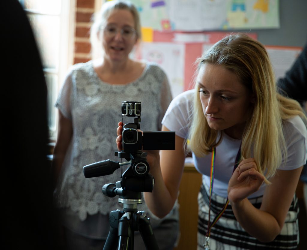 Attendee using camera.