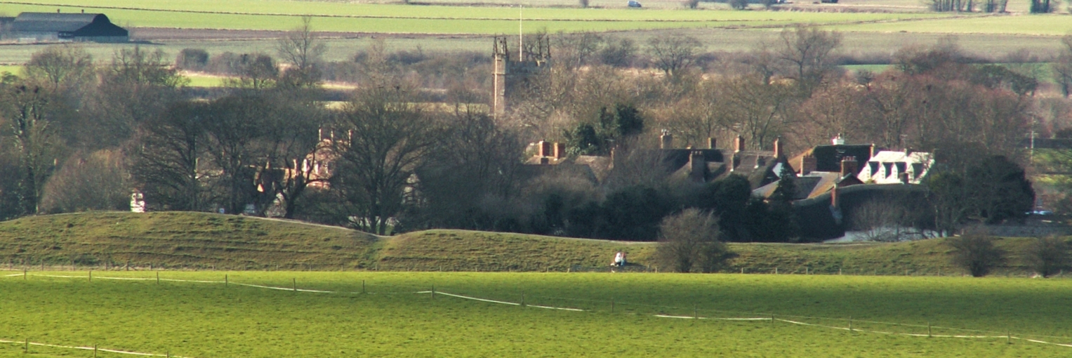 Avebury henge Neolithic banks seen from the nearby causewayed enclosure at Windmill Hill (Wiltshire, United Kingdom). 