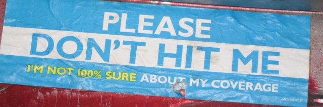 Photo of an insurance disclaimer sticker on a car.