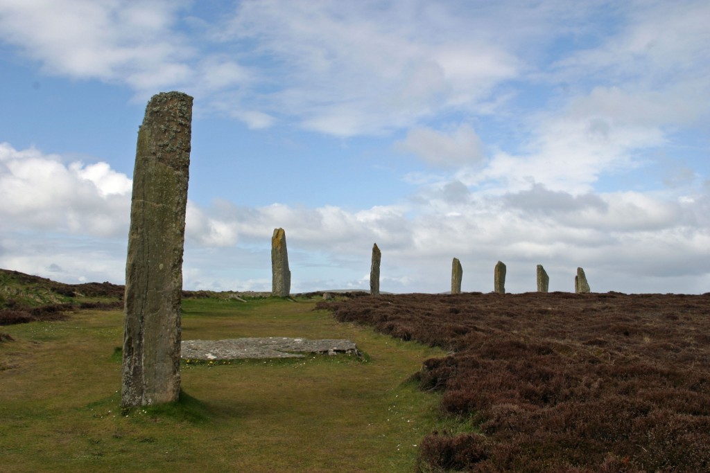 Photo of the Ring of Brodgar, a henge-like (but without a visible bank) ditched enclosure in Orkney, Scotland. Like other henges, it possess megaliths or standing stones.