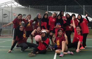 A lighthearted shot taken after the tournament with some Reading netball team members.
