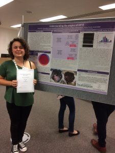 Rachel Owens presenting her poster and award
