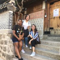 Touristy pictures to be expected! Left to right, me, our buddy Gayoun, and Rebecca outside a traditional style house in Bukchon Hanok Village.
