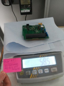 Verifying the estimated mass of one of the prototypes of the on-board computer.