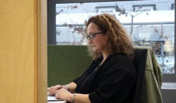 Alessia Plutino is pictured working at her desk