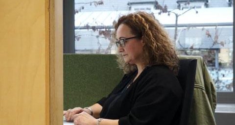 Alessia Plutino is pictured working at her desk