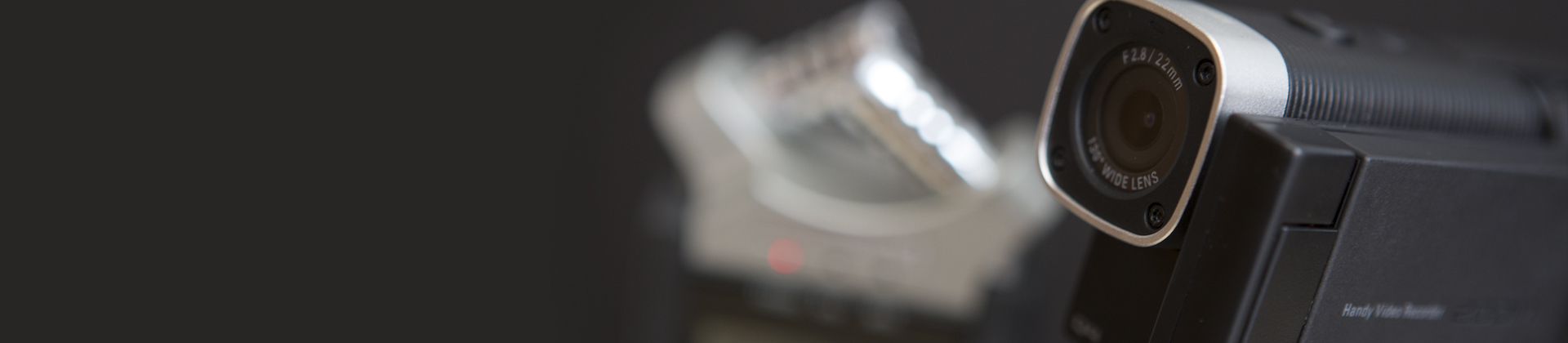 Close up of a camera viewfinder on a dark background.