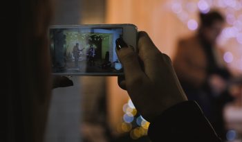 Someone filming a video on a smartphone.