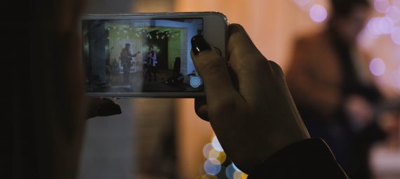 Someone filming a video on a smartphone.