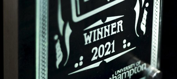 Close-up of Excellence in VLE Awards trophy with text 'Winner 2021' and 'University of Southampton'