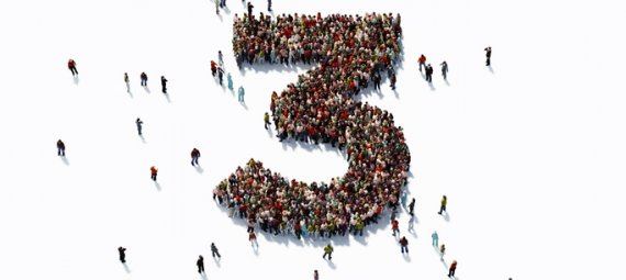 Human crowd forming a big number three on white background.