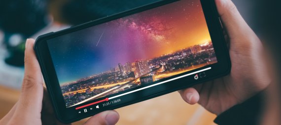 Watching a video on a mobile phone.