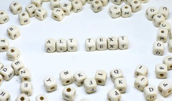 Alt text spelt with letters on dice.