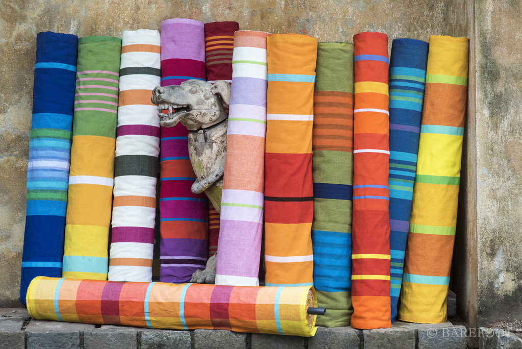 Rolls of hand woven cloth designed by BAREFOOT. Image courtesy of image credit for Barefoot Ceylon.